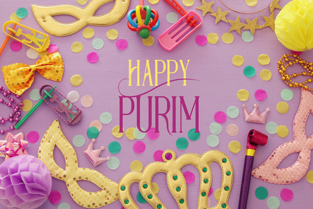 普林庆祝概念 犹太狂欢节假日 在木粉红色背景