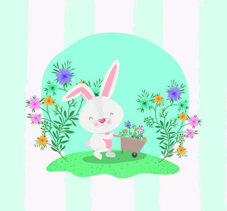 兔子和手推车与鲜花在花园里