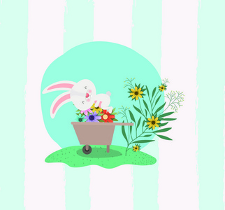 兔子和手推车与鲜花在花园里