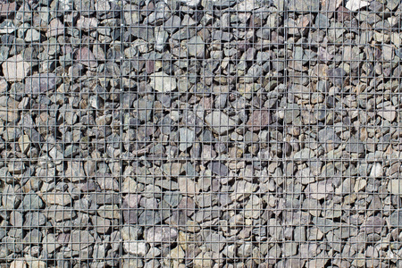 加比昂岩壁，钢丝笼中的石头，花园中的装饰岩石立方体