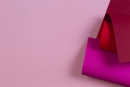 洋红色的几何形状抽象几何形状粉红色品红色彩色纸背景照片
