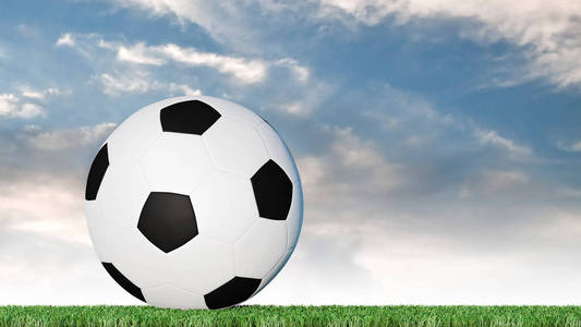 足球放在草坪上，有蓝天背景