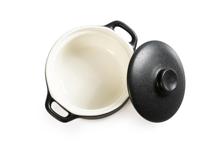 炊具隔离在白色上。 外面是黑色的，里面是白色的。 烤锅。