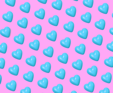 粉红色背景上的蓝色心脏图案