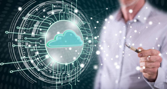 用钢笔触摸触摸屏上的云计算系统概念照片