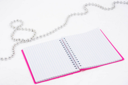 s Day. Signature notebook, beads are laid out in the shape of a 