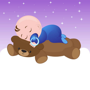 男婴睡在一只玩具熊上