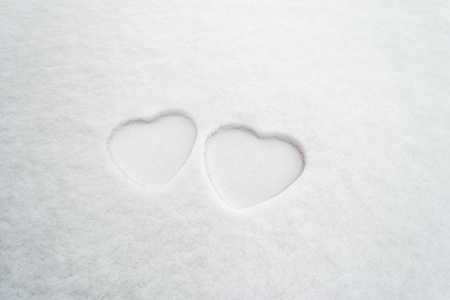 s Day concept with outlines of two hearts in the snow. Mother3