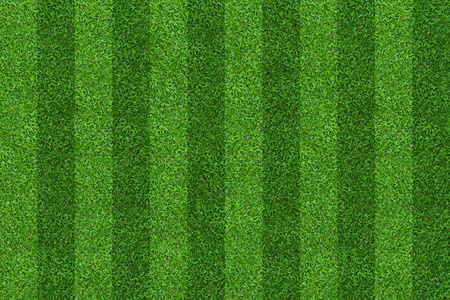 足球和足球运动的绿草地背景。绿色草坪图案及纹理背景..特写图像。