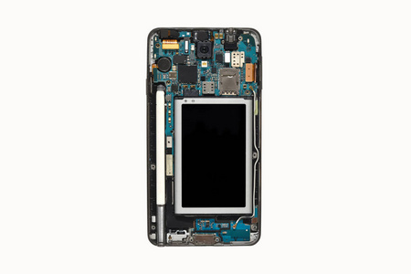 拆卸的旧智能手机手机隔离在白色背景上。