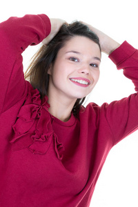 美丽的，微笑的年轻女子，红毛衣