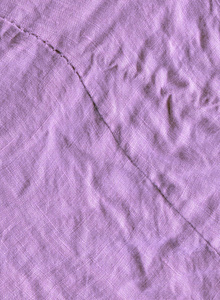 紫色织物背景。 紫色纺织品纹理背景