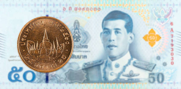 交易币25泰沙币兑50新泰铢钞票照片