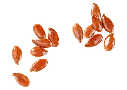 棕色亚麻籽在白色背景顶部视图。 健康的食物。
