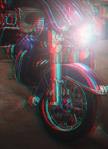 带前照灯的摩托车。 用Aaglyph3D效果制作的照片。
