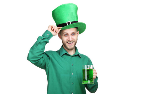 s Day. Young man wearing green hat with glass of beer on white b