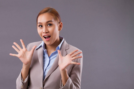  portrait of happy positive surprised excited asian business wom