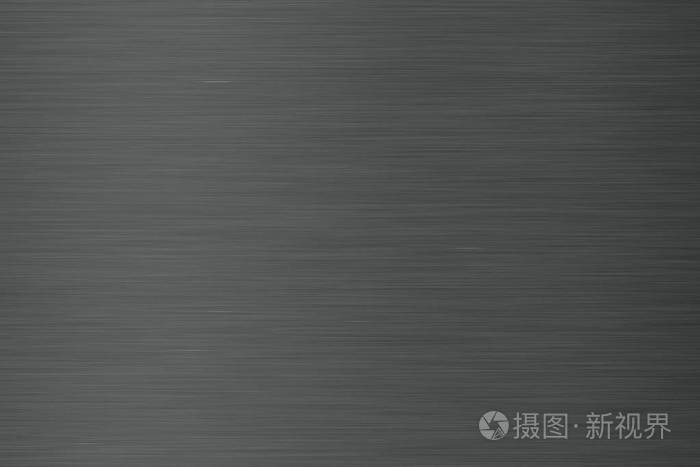 刷过的深色金属纹理. 抛光金属纹理背景与光反射.
