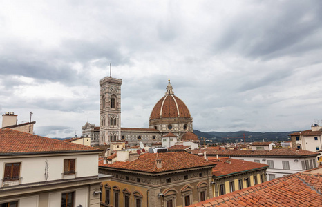 s bell tower from the rooftops in Florence, Italy