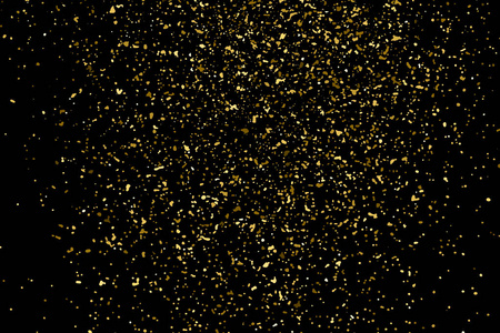 金色闪光的纹理隔离在黑色上。 琥珀颗粒的颜色。 庆祝背景。 纸屑的金色爆炸。 设计元素。 数字生成的图像。 矢量插图EPS10。