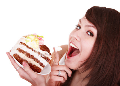 女孩吃一块蛋糕