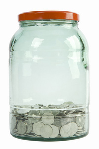 玻璃罐装满硬币