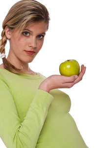 健康的生活方式系列持有绿色苹果的女人