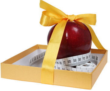 磁带线像礼品盒中的红苹果