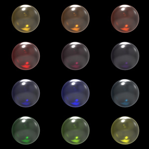 孤立在黑色背景上的玻璃不同颜色球组