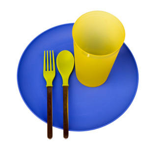 Plasticplate,cup,spoon and fork, isolatedon white backgr