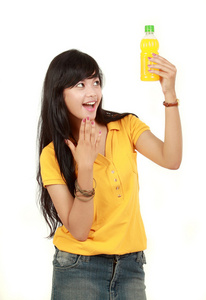 少女手中的柳橙汁图片