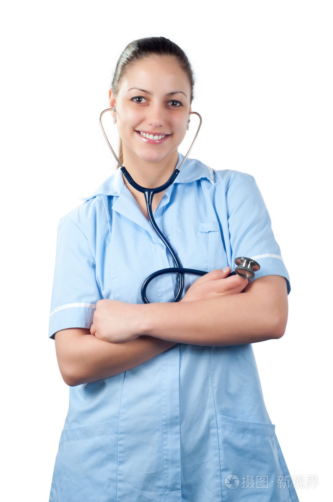 年轻漂亮的微笑着的女医生用听诊器上白色隔离