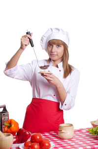 有吸引力的厨师女人一在白色的背景