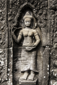 古代石雕在吴哥窟。柬埔寨