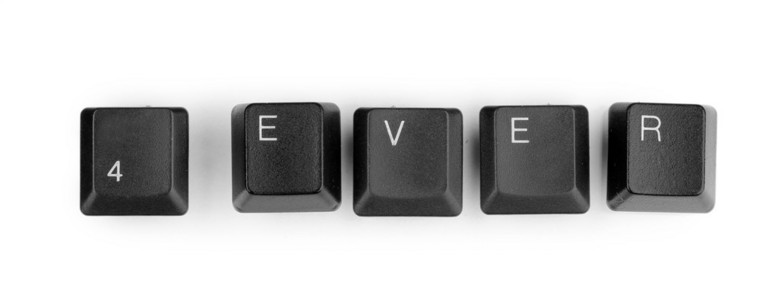 说 4ever 孤立在白色的键盘键