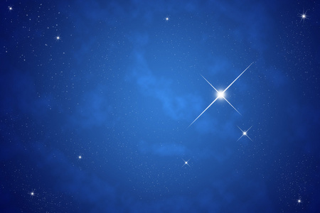 在夜晚的天空上的亮星照片