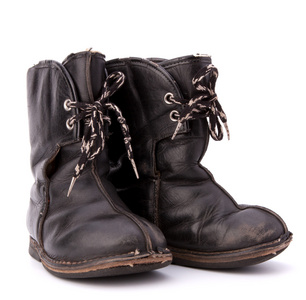 复古破旧儿童靴子照片