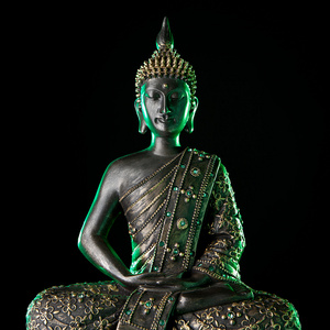 佛像与发光照片