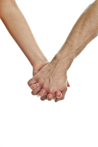 男人的手牵着女人的手。白色衬底上分离