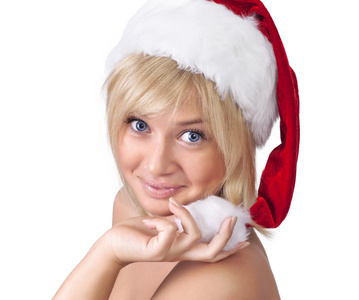 美丽的微笑着圣诞老人的帽子，女人肖像