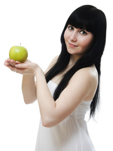 一个美丽的女人，举行一个苹果的肖像