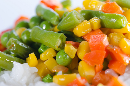 Rice and sauted vegetables close up