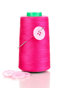 粉红纱管与针和孤立在白色的按钮