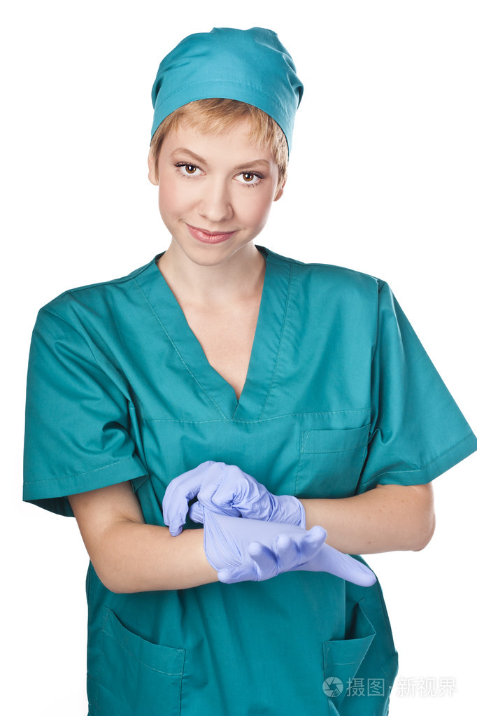 在手套的年轻护士医务人员stodio拍摄