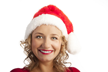 一个可爱的女孩戴着圣诞帽的肖像