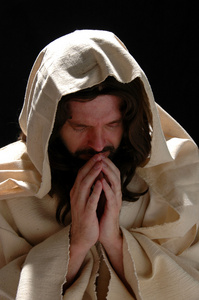 耶稣在祷告中的肖像照片