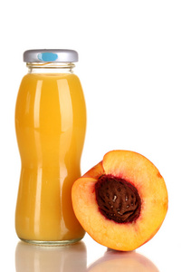 在玻璃瓶和旁边它隔绝对惠特桃美味桃汁