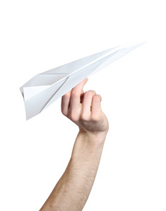 启动分离在白色背景上的白色纸飞机的人的手