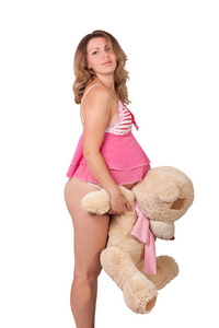 甜怀孕的女孩与一个玩具