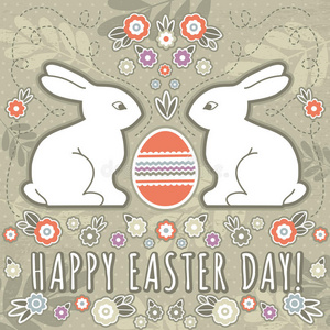 复活节彩蛋和两只兔子的贺卡